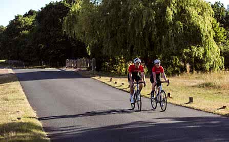 LCC challenge event team jersey worn by Toby cycling in park