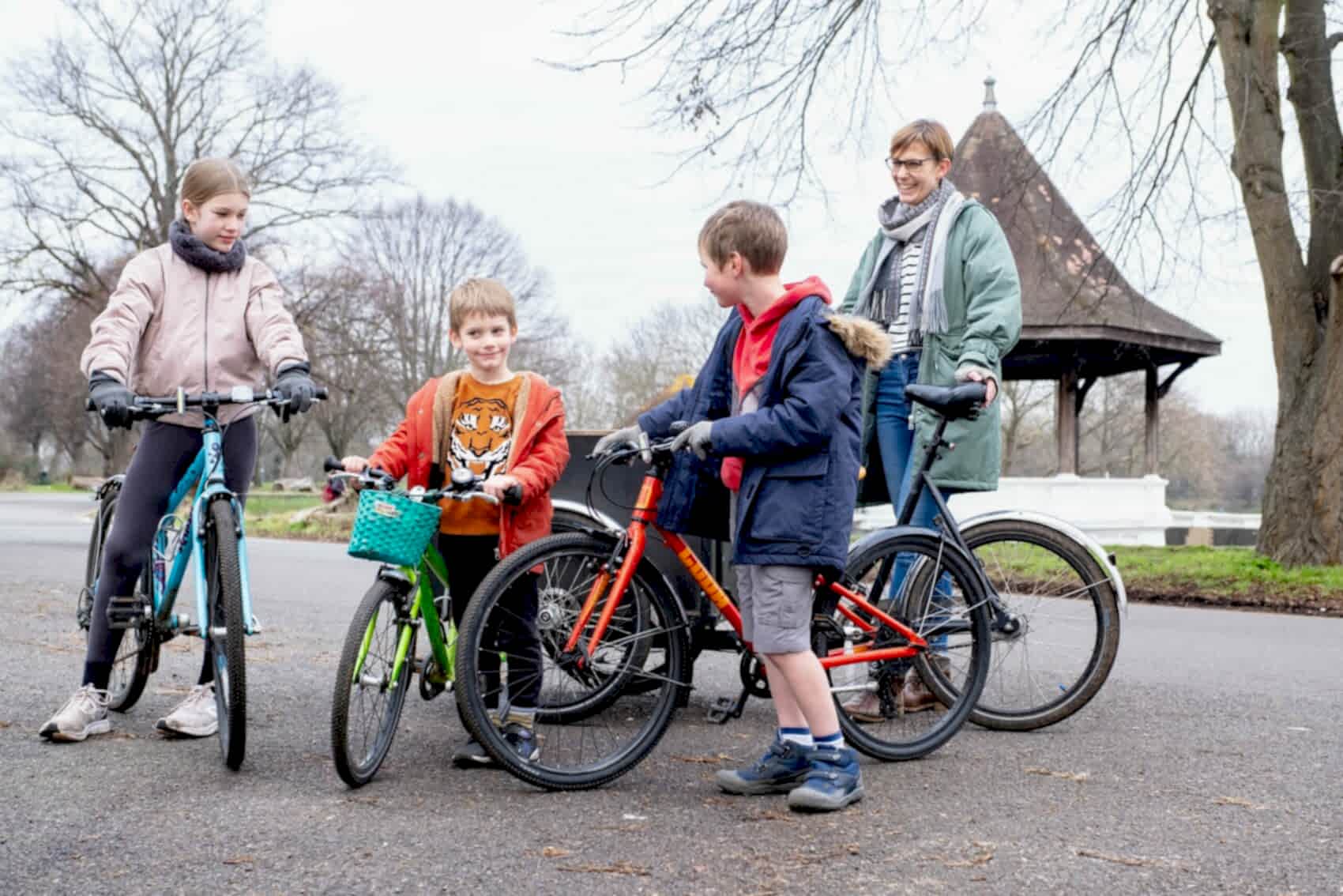 Woman with children in cargo bike