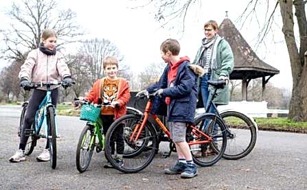 Woman with children in cargo bike